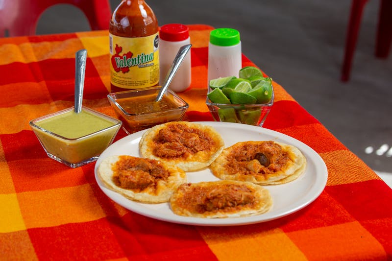 Birria beef dipped tacos with consomme